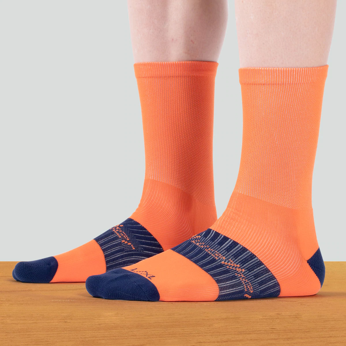 Bellwether-Tempo-Socks_Yes_Color-ORANGE-Size-L/XL